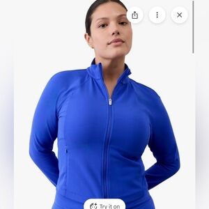 Athleta Women's Vibrant Saluation Crop Track Jacket - Sz Large
varsity color